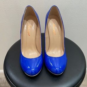 Royal blue heels size 9, worn twice.